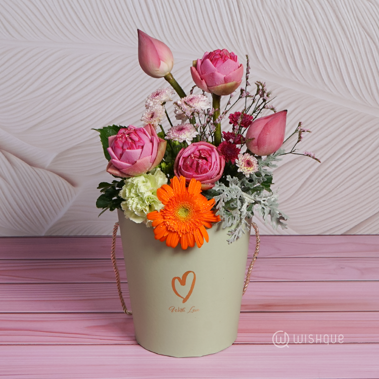 Gentle Radiance Floral Bucket