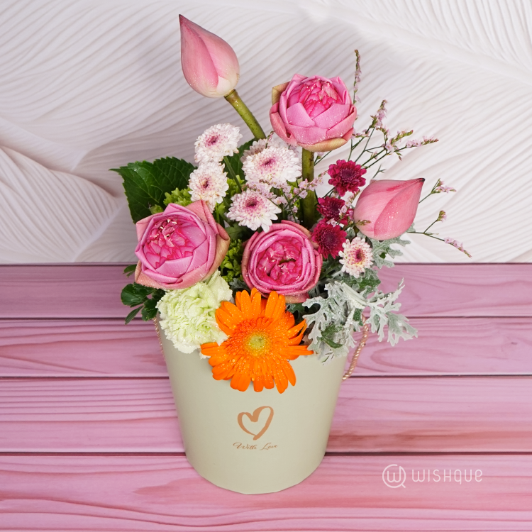 Gentle Radiance Floral Bucket