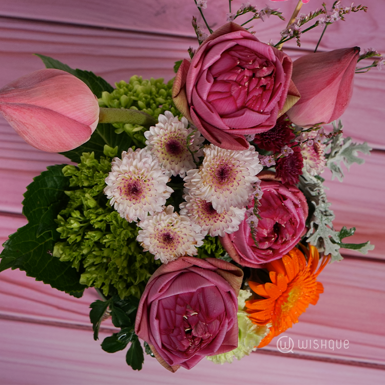 Gentle Radiance Floral Bucket