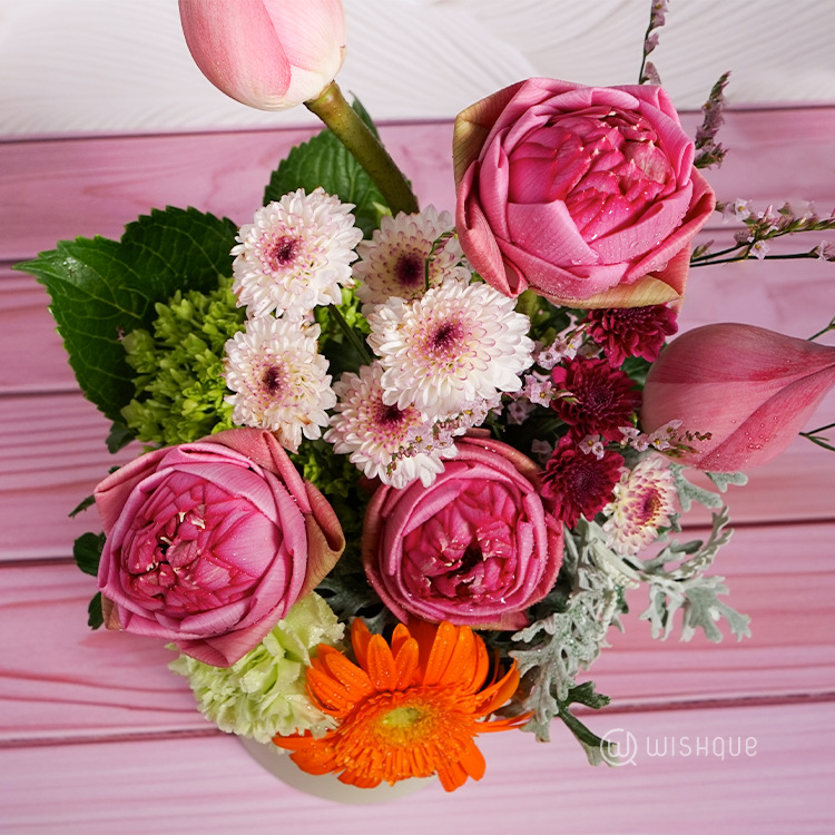 Gentle Radiance Floral Bucket