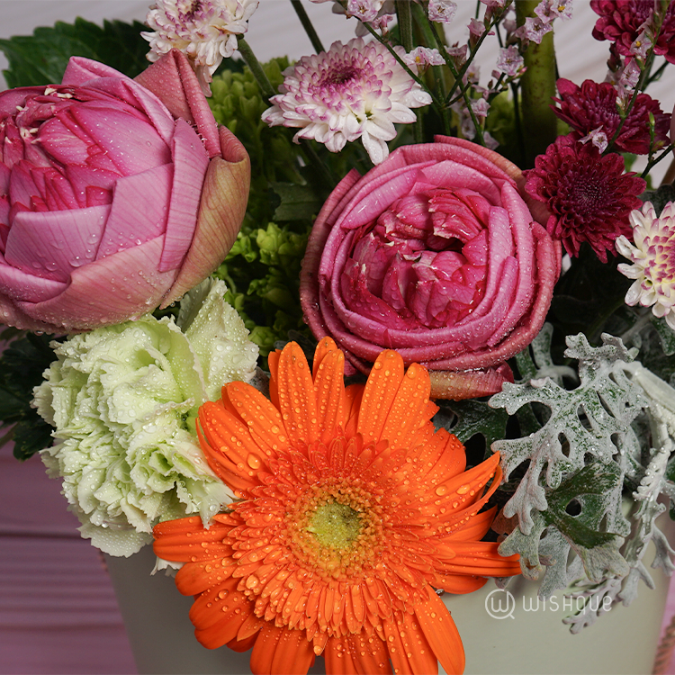 Gentle Radiance Floral Bucket