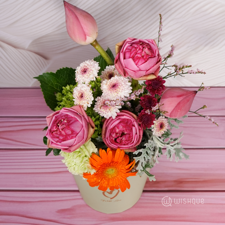 Gentle Radiance Floral Bucket