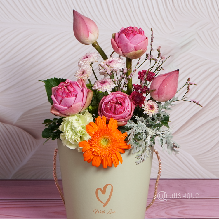 Gentle Radiance Floral Bucket