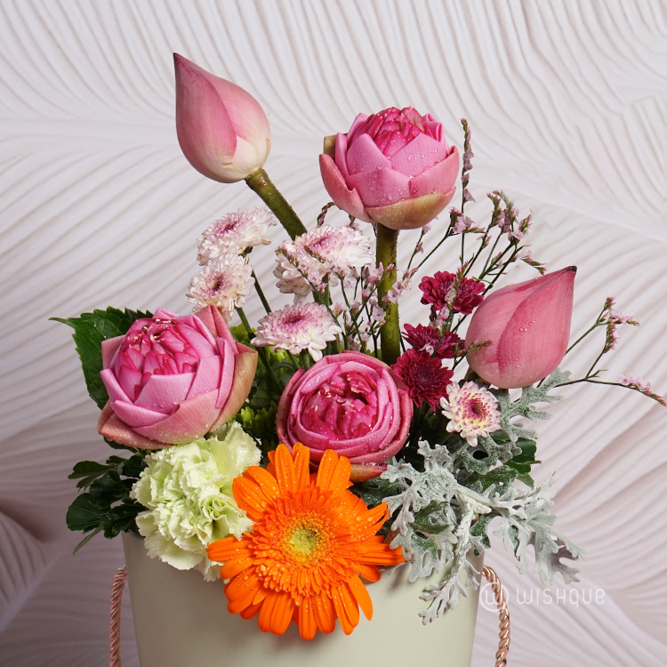 Gentle Radiance Floral Bucket