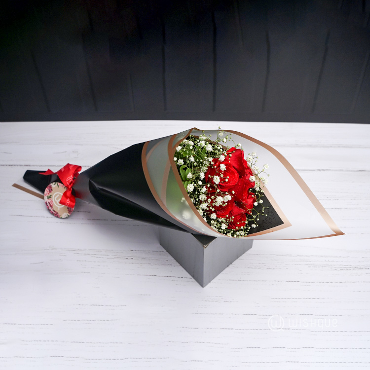 Seven Serenades Red Rose Bouquet